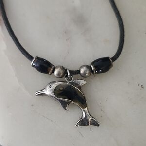 Silver Toned Dolphin Pendant Necklace On Black Rope Chain